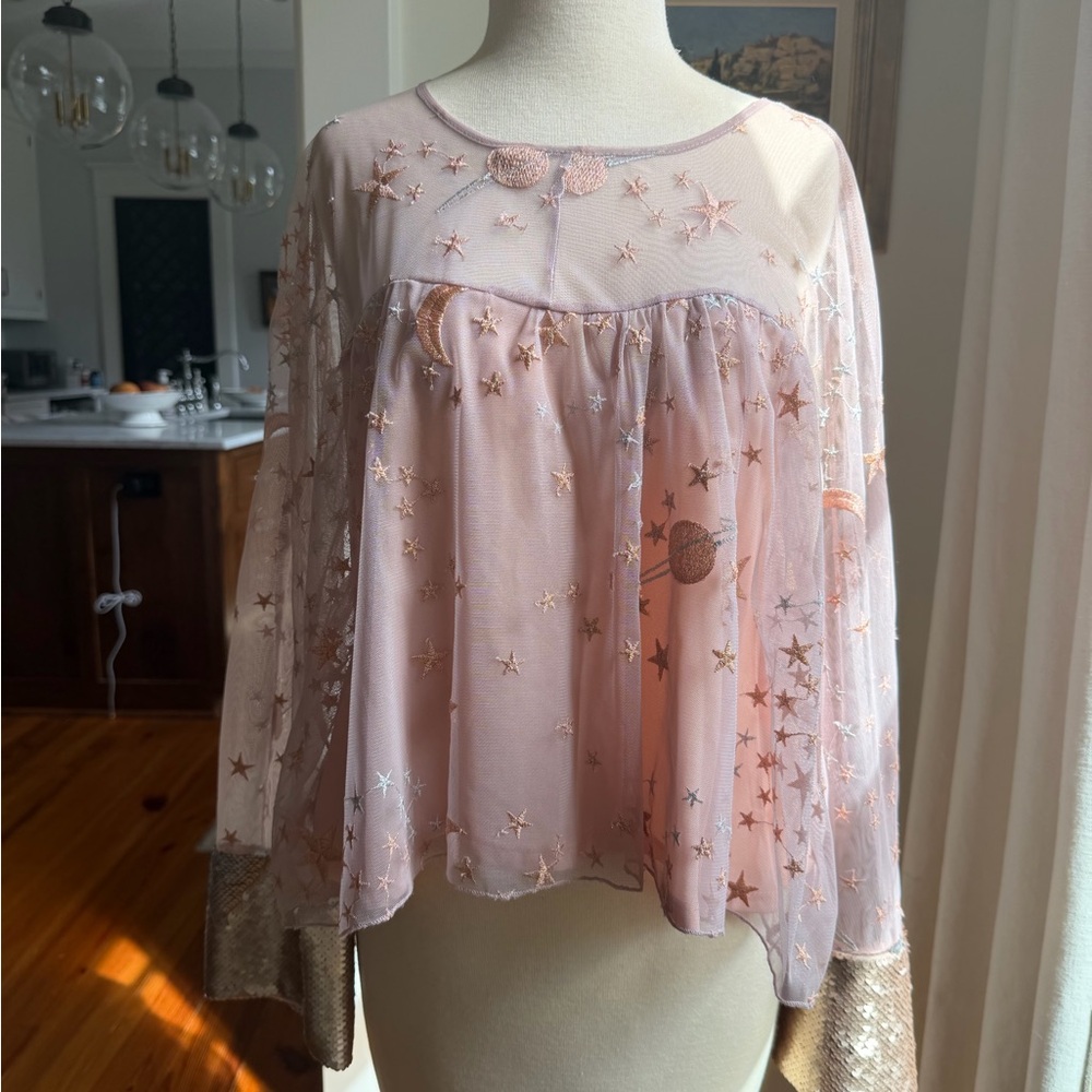 Ban•Jara Sheer Top with Metallic Aappliques and Sequined Cuffs.